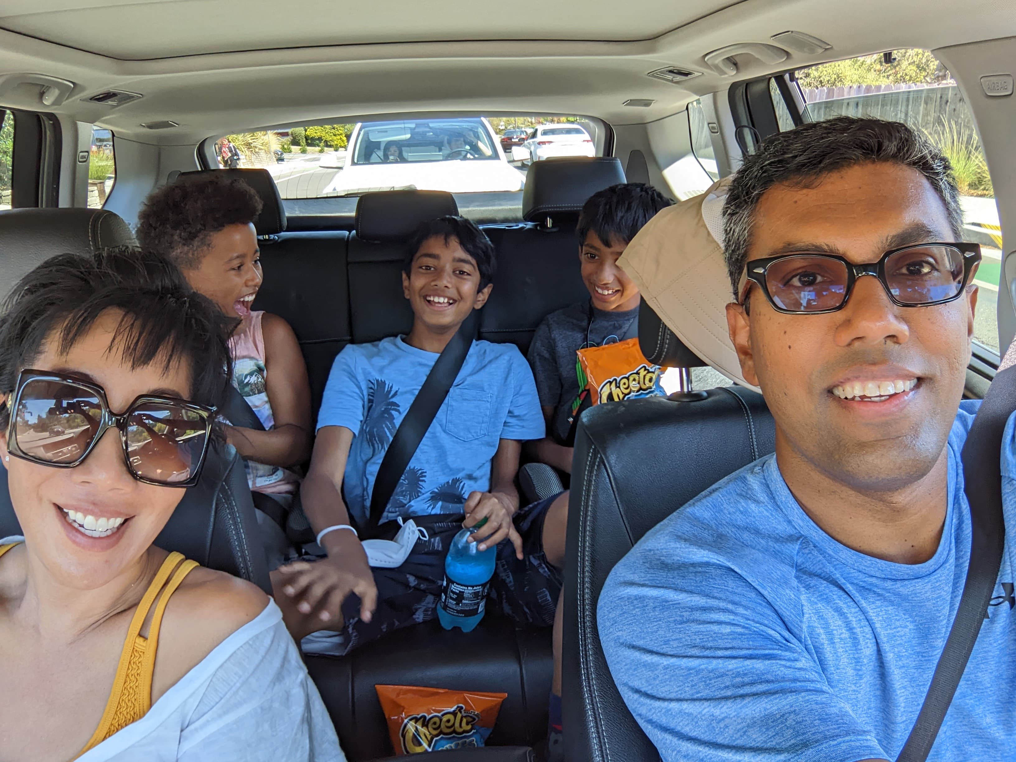 Our family laughing together in the car